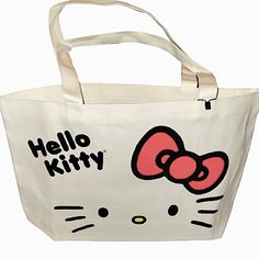 Nwot Hello Kitty Tote Canvas Shopper Bag. 100% Canvas Approx Size: 16 3/4”L X 11”H X 4”W Please Note That There May Be A Slight Color Variations On The Bow And Hk Whiskers, But Design Is As Pictured. Kawaii Hello Kitty Print Rectangular Bag, Trendy Hello Kitty Everyday Bag, Hello Kitty Rectangular Bag For Daily Use, Trendy Hello Kitty Bag For Everyday, Trendy Hello Kitty Bags For Everyday Use, Rectangular Hello Kitty Print Shoulder Bag For Shopping, Trendy Rectangular Bag With Hello Kitty Print, Trendy Hello Kitty Print Bag For Everyday Use, Cute Tote Bag With Cat Design