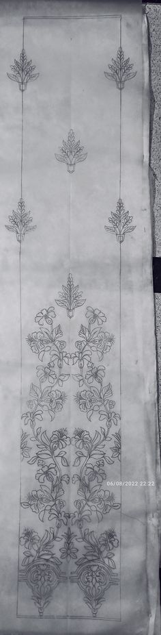 an old piece of paper with designs on it