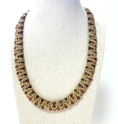 "Elegant and fancy beige and gold statement necklace. This handmade special necklace is feminine and impressive for evening parties or other special occasions. It is also a perfect gift to your wife or someone you love. I created this beautiful beige and gold necklace by hand, using Miyuki round seed beads and Czech beads. Closing is by gold-plated brass lobster claw clasp. ♦ 𝗠𝗘𝗔𝗦𝗨𝗥𝗘𝗠𝗘𝗡𝗧𝗦 ♦ Total length necklace: 18.11'' (46 cm) Total Width: 0.59\" (1.5 cm) ♦ 𝗨𝗽𝗴𝗿𝗮𝗱𝗲 𝘆𝗼𝘂𝗿 𝗷𝗲𝘄𝗲𝗹𝗿𝘆 𝗰𝗼𝗹𝗹𝗲𝗰𝘁𝗶𝗼𝗻 𝘄𝗶𝘁𝗵 𝘁𝗵𝗲𝘀𝗲 𝗯𝗲𝗮𝘂𝘁𝗶𝗳𝘂𝗹 𝗻𝗲𝗰𝗸𝗹𝗮𝗰𝗲 ♦ ♦ 𝗧𝗵𝗼𝘂𝗴𝗵𝘁𝗳𝘂𝗹𝗹𝘆 𝗽𝗮𝗰𝗸𝗮𝗴𝗲𝗱 𝗶𝗻 𝗮 𝗴𝗶𝗳𝘁 𝗯𝗼𝘅 ✧ For more statement necklaces click here: https://www.etsy.com/il-en/shop/liorajewelry?section_id=19063257 Back to my shop: https://www.e Brown Beaded Chain Jewelry For Parties, Brown Choker Necklace For Party, Brown Gold Beads Jewelry For Party, Beige Beaded Necklaces For Parties, Party Beaded Beige Necklaces, Elegant Handmade Gold Beads, Beige Beaded Necklace For Party, Elegant Beige Beaded Chain Necklace, Party Beaded Beige Necklace