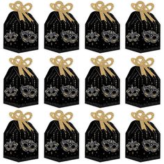 black and gold gift bags with masks on them for masqueradee party favors