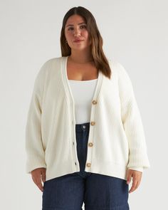 Discover the ultimate blend of comfort and sustainability with our 100% Organic Cotton Oversized Boyfriend Cardigan. This versatile piece effortlessly complements any outfit for everyday wear. Made from soft organic cotton, it's both eco-friendly and cozy. Complete with a button-down front and a classic fisherman stitch, this timeless cardigan is the perfect addition to any outfit.Looking for our cashmere iteration? Check it out hereAlso offered in sizes 1X-3X. Fall Cardigan Outfits, Basics Capsule, Created Colorful, Outfit Capsule, Outfit For Everyday, Silk Pajamas Shorts, Boyfriend Cardigan, Quarter Zip Sweater, Button Cardigan