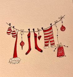 christmas stockings hanging on a clothes line with ornaments and decorations around them, painted in watercolor