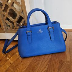 Beautiful Blue Island Deep Blue Color Crosshatched Leather, Like New, Only Used A Few Times Top Handle Bag With Snap Closure And Removable Strap Double Slide Pockets, Interior Zipper Pocket, And Middle Zip Pocket Kate Spade New York Gold Printed Signature With Tiny Cutout Spade Color: Island Deep Style #: Wkru2790-4 12.5" Length 8.25" Height 4" Width Medium Handbags, Blue Island, Gold Print, Kate Spade Bag, Leather Satchel, Kate Spade New York, Deep Blue, Blue Leather, Zipper Pocket