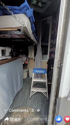 the inside of a camper that is full of furniture and other things in it