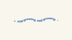 the word still growing is written in blue on a white background