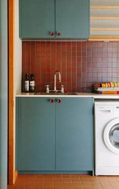 a washer and dryer in a small kitchen