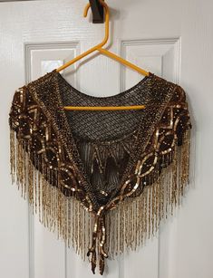 This item is a beautiful evening shawl with just enough sequins and shine to make your event perfect. It is a size small, though not noted on the garment. It has never been worn, but was previously owned. The colors are beautiful and the wrap is held closed by weighted tassels. Sequin Shawl, Beaded Shawl, Vintage Shawl, Evening Shawls, Vintage Shawls, Beautiful Evening, Beaded Wraps, Historical Fashion, 70s Fashion