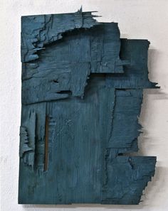 a piece of wood that has been painted blue