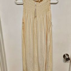 Commune Cotton Maxi Dress In Cream Size S Nwt Beige Lined Midi Dress For Daywear, Beige Sleeveless Rayon Dress, Cream Summer Dress With Smocked Back, Beige Sleeveless Midi Dress For Daytime, Sleeveless Rayon Daytime Dress, Flowy Beige Rayon Midi Dress, Beige Smocked Back Sundress, Cream Sleeveless Midi Dress For Brunch, Daytime Rayon Sundress