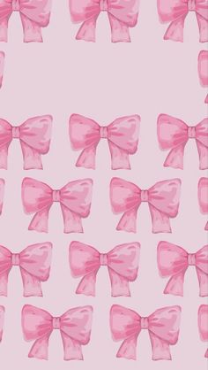 a pink bow pattern on a light pink background