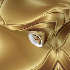 an abstract gold background with swirls and curves