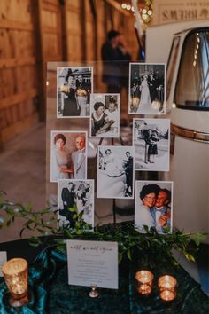 a table topped with pictures and candles next to a refrigerator freezer covered in photos