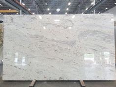 a large white marble slab in a warehouse