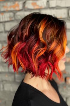 Short wavy bob haircuts are the epitome of chicoffering a playful yet sophisticated style that's Autumn Vivid Hair Color, Short Fire Hair, Short Wavy Bob Haircuts, Fire Ombre Hair, Sunset Hair Color, Flame Hair, Color Block Hair, Bob Ideas, Dynamic Personality