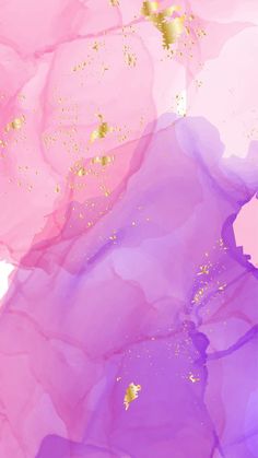 an abstract pink and purple background with gold confetti