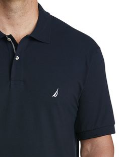 Comfortable, breathable and made to move with you, this classic Nautica polo shirt is crafted in a stretch cotton blend and features an embroidered chest logo, giving it a signature look that's versatile enough to wear everywhere from the office to a night out on the town. 96% cotton/4% elastane Finely ribbed collar 2 button placket Signature embroidered chest logo Short sleeves; ribbed-knit cuffs Tennistail hem For additional colors, see G4542 Machine wash; imported Moisture-wicking Cotton Collared Polo Shirt, Casual Navy Polo Shirt With Embroidered Logo, Navy Cotton Moisture-wicking Polo Shirt, Classic Moisture-wicking Polo Shirt, Pique Polo Shirt, Signature Look, Anniversary Sale, Knit Cuff, Button Placket