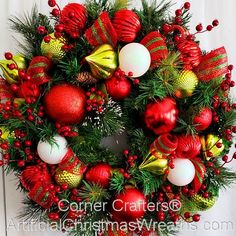 a christmas wreath with red and green ornaments