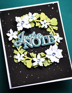 a handmade greeting card with flowers and the words, like a note on it