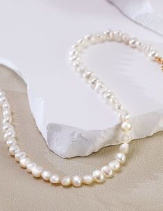 Classic Pearl White Necklace With Clavicle Chain, Elegant Necklace With Pearl Charm And Round Beads, Elegant Necklaces With Pearl Charm And Round Beads, Classic Baroque Pearl Drop Necklaces, Baroque Pearl Drop Necklace For Formal Occasions, Elegant Baroque Pearl Jewelry In Pear Shape, Formal Baroque Pearl Necklace With Pearl Charm, Classic Baroque Pearl Chain Necklace, Formal Baroque Pearl Necklace With Charm