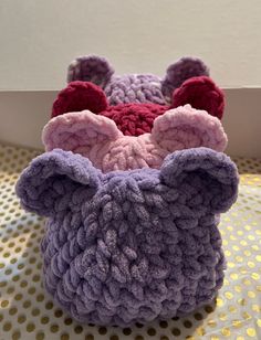 there is a crocheted bag with ears on it