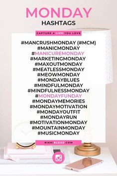 a white table topped with a lamp next to a sign that says monday hashtags