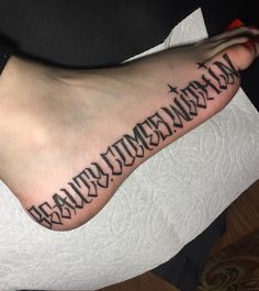 a person's foot with the word deathwirn on it and an arrow