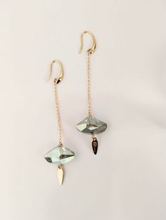 Simply Sporty,  these earrings feature a Gray Wide Faceted Flat Triangled Teardrop Crystal (24x14 mm) , hanging from an 18K  Gold Filled Chain, attached to an 18K Gold Plated Hook.  Enjoy . - Gray Faceted Wide Crystal Triangled Teardrop - 18K Gold Filled Chain and 18K Gold Plated Hooks - Handmade in the USA Length is  3.50Inches approx. Beaded Earrings Tutorials, Earring Tutorial, Crystal Drop, Faceted Crystal, Gold Filled Chain, Beaded Earrings, Gold Filled, 18k Gold, Gold Plate