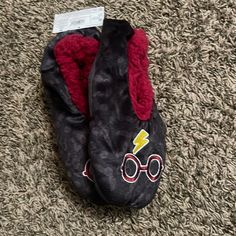 Size S/M(4-7). Color Black. Grippers Underneath Slippers Harry Potter Symbols, Elf Slippers, Harry Potter Glasses, Embroidered Slippers, Grey Socks, Sock Game, Fuzzy Slippers, Slippers For Girls, Casual Slippers