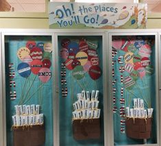 the bulletin board is decorated with balloons and words that say oh, the places you'll go