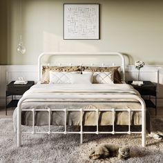 a white bed sitting on top of a shaggy rug