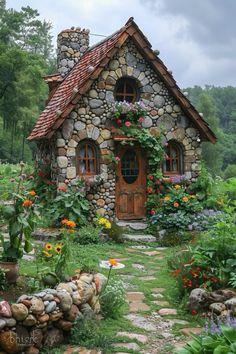 a small house made out of rocks and flowers