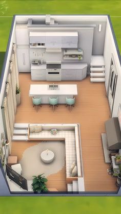 an aerial view of a kitchen, dining room and living room in a house plan