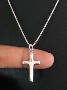 "Classic Cross Necklace, Sterling Silver Cross Pendant NECKLACE FEATURES: Metal: All components are made from solid .925 Sterling Silver Model is wearing 16\" in length solid .925 Sterling Silver Chain Length available: 16\", 18\" or 20\" MEASUREMENT: Sterling Silver Cross Pendant Height: 28 mm (1.1 inches) Width: 14 mm (0.55 inch) Your Sterling Silver Cross Necklace will arrive in a gift box, beautifully wrapped and ready for gifting Please send me a message if you have any questions before or Jesus Artwork, Beaded Ankle Bracelets, Jewelry Cross, Pendant Minimalist, Silver Model, Silver Cross Necklace, Faith Necklace, Sterling Silver Cross Necklace, Fire Opal Necklace