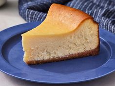 a piece of cheesecake on a blue plate