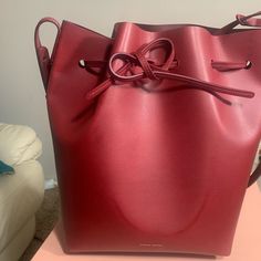 Brand New, Never Used! Super Pretty Bordo Color! Comes With Box! Bought From Actual Boutique! Burgundy Bucket Shoulder Bag, Red Double Handle Leather Bucket Bag, Mansur Gavriel Soft Candy Bag, Black Duffel Bag, Pink Loafers, Mansur Gavriel Bucket Bag, Mansur Gavriel Bag, Black Bucket Bag, Mini Duffle Bag