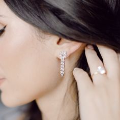 The Diamond Pretty Lady Drop Earrings were designed by Emily for her wedding day, and have been worn by many brides since. Featuring 2.67 carats of diamond set in a floral-inspired stud and detachable leaf-inspired drop, this stunning style sure does live up to its name. These earrings can be customized with your desired carat weight. To create your own perfect pair, please email us at orders@efcollection.com. Fine Jewelry Brilliant Cut Cluster Earrings For Wedding, Brilliant Cut Fine Jewelry Cluster Earrings For Wedding, Brilliant Cut Cluster Earrings For Wedding, Wedding Fine Jewelry Brilliant Cut Cluster Earrings, Wedding Fine Jewelry Diamond Earrings, Luxury Wedding Cluster Earrings With Diamond Accents, Fine Jewelry Cluster Earrings For Wedding, Diamond White Marquise Cut Cluster Earrings For Wedding, Cubic Zirconia Round Cut Cluster Earrings For Wedding