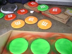 some green and orange cookies sitting on top of a table