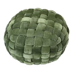 a green round pillow with braiding on the top and bottom, sitting in front of a white background