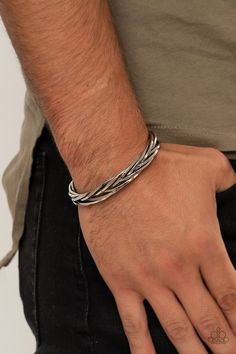 Paparazzi Accessories-Rustic Reveler - Silver Bracelet Item #P9MN-URSV-035XX Brushed in an antiqued finish, rustic silver bars weave and braid into an edgy cuff around the wrist. Sold as one individual bracelet. This piece was featured as part of our Fall Training during Unwritten. Silver Kada For Men, Men Bracelet Silver, Mens Silver Bracelets, Mens Jewelry Bracelet Silver, Silver Bracelets For Men, Men Jewellery, Man Bracelet, Mens Bracelet Silver, Jewelry Bracelets Silver