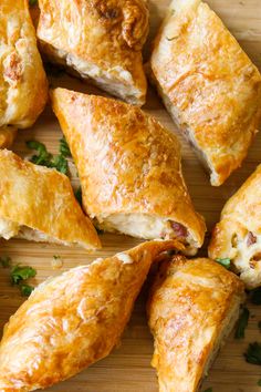 some food that is on top of a cutting board with the words super easy potato knishes