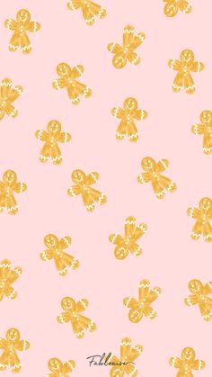 a pink background with gold bows on it