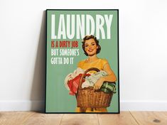 a poster on the wall that says laundry is a dirty job but someone's gotta do it