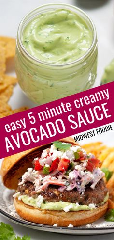 an avocado sauce on top of a burger with the words easy 5 minute creamy avocado sauce