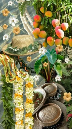 an arrangement of flowers, hats and other items on display in front of a pool