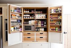 an organized pantry with lots of food items