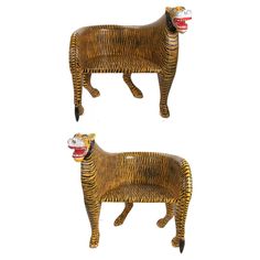 two wooden animal sculptures on white background