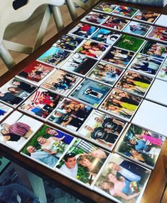 a table topped with lots of different pictures