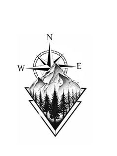 a compass with trees and mountains on it