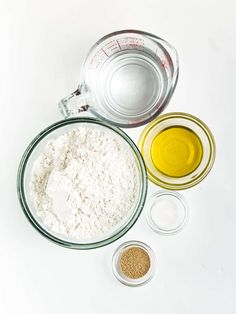 ingredients to make an oatmeal smoothie laid out on a white surface