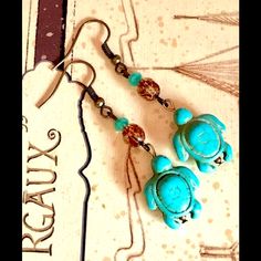 Turquoise Blue Howlite Stone Turtles Paired With Copper Glass Faceted Beads, Accented By Turquoise Glass. Length Including Bronze Hooks 2.25”. Width .5”. Tropical Jewelry, Blue Howlite, Earrings Beach, Howlite Stone, Copper Glass, Ocean Colors, Turquoise Glass, Faceted Bead, Turquoise Jewelry